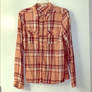 Plaid button up long sleeve shirt.